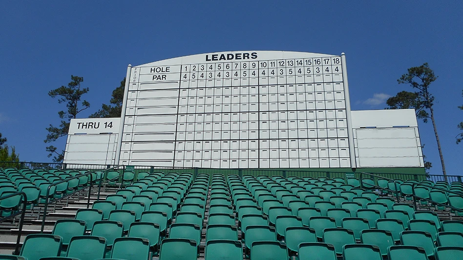 Rory McIlroy lining up a crucial putt on the 18th green at Augusta National during the final round