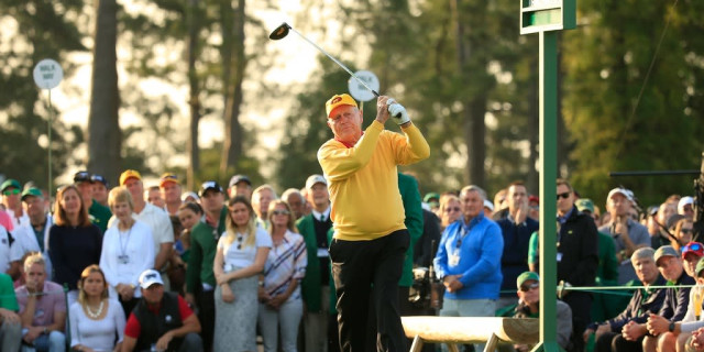 Ben Hogan demonstrating his focused stance and precise swing mechanics on a tournament fairway